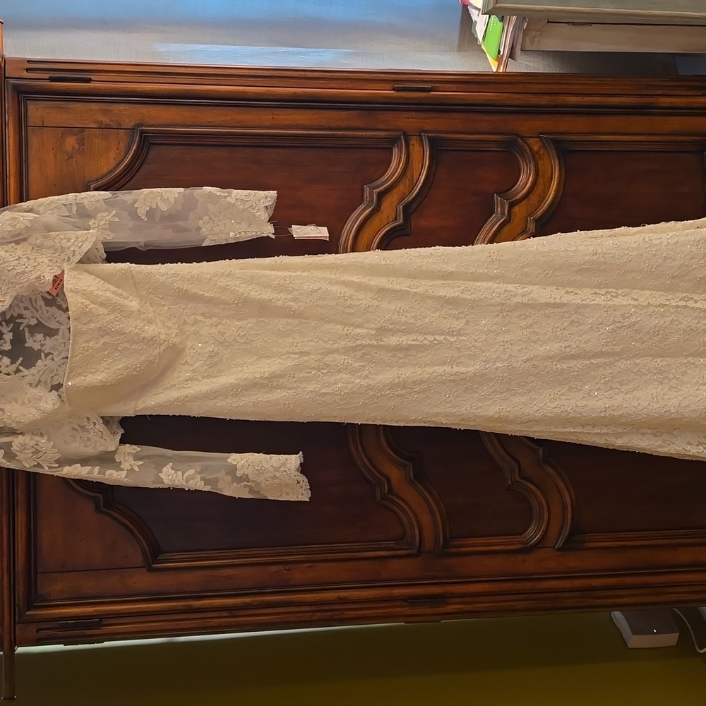 David's Bridal wedding gown with crop jacket!!  Dress is a size 6 jacket a small